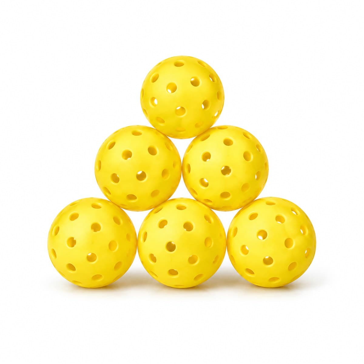 Six yellow perforated pickleballs stacked in a triangle