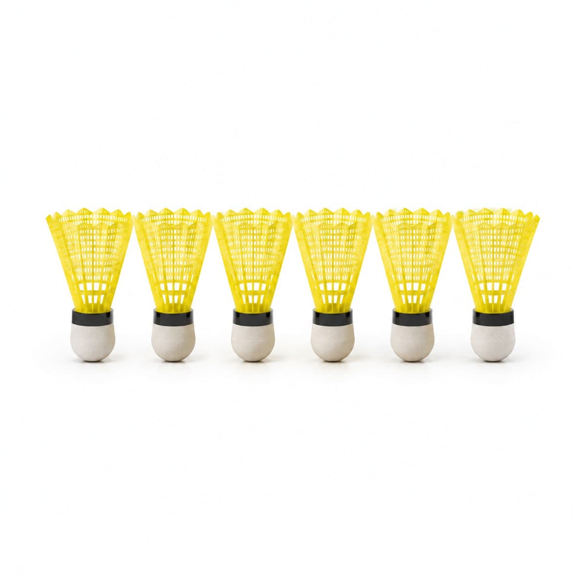 Six shuttlecocks with yellow nylon skirts, black bands and rounded bases in a row